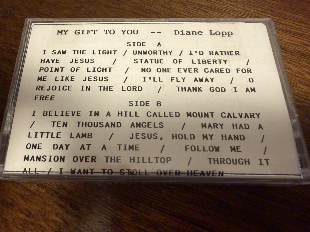 The My Gift to You cassette case with the printed song list