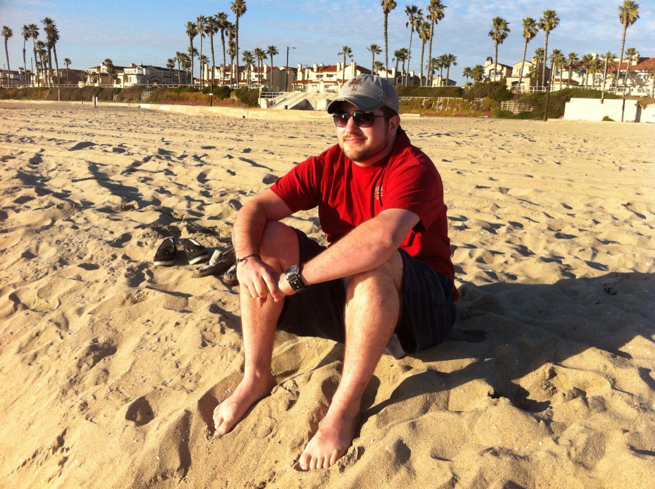 Shawn Lopp sitting on a sunny beach