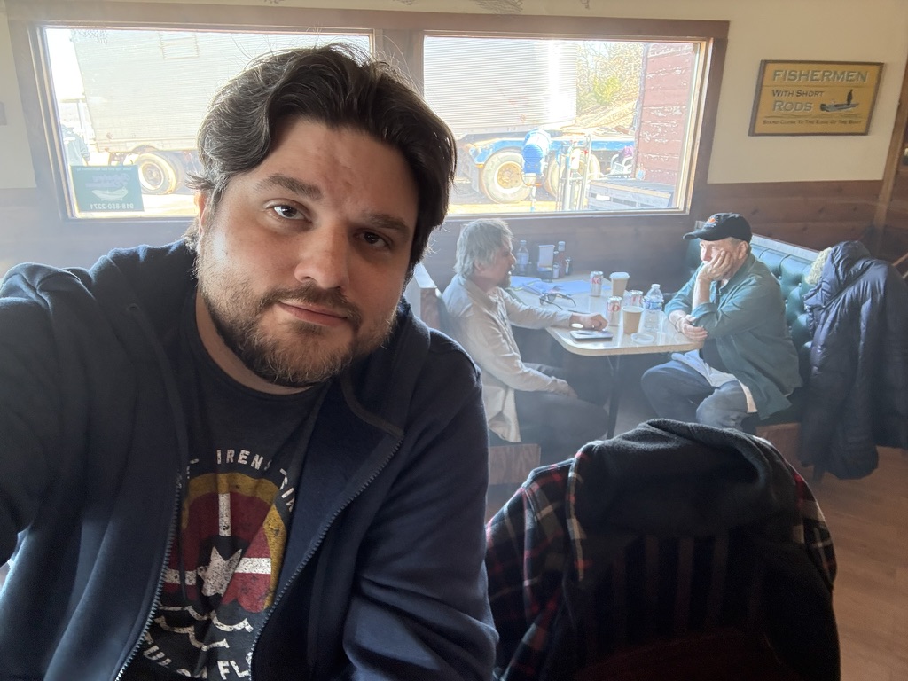 Shawn Lopp on the set of The Lowdown with Ethan Hawke in the background